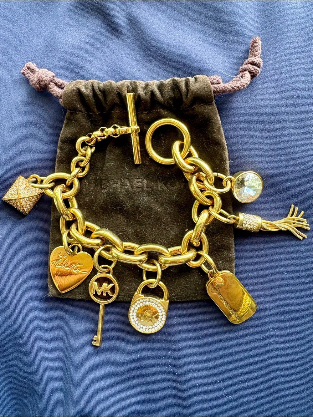 Michael Kors Gold Charm Toggle Bracelet - Gold.  NEW